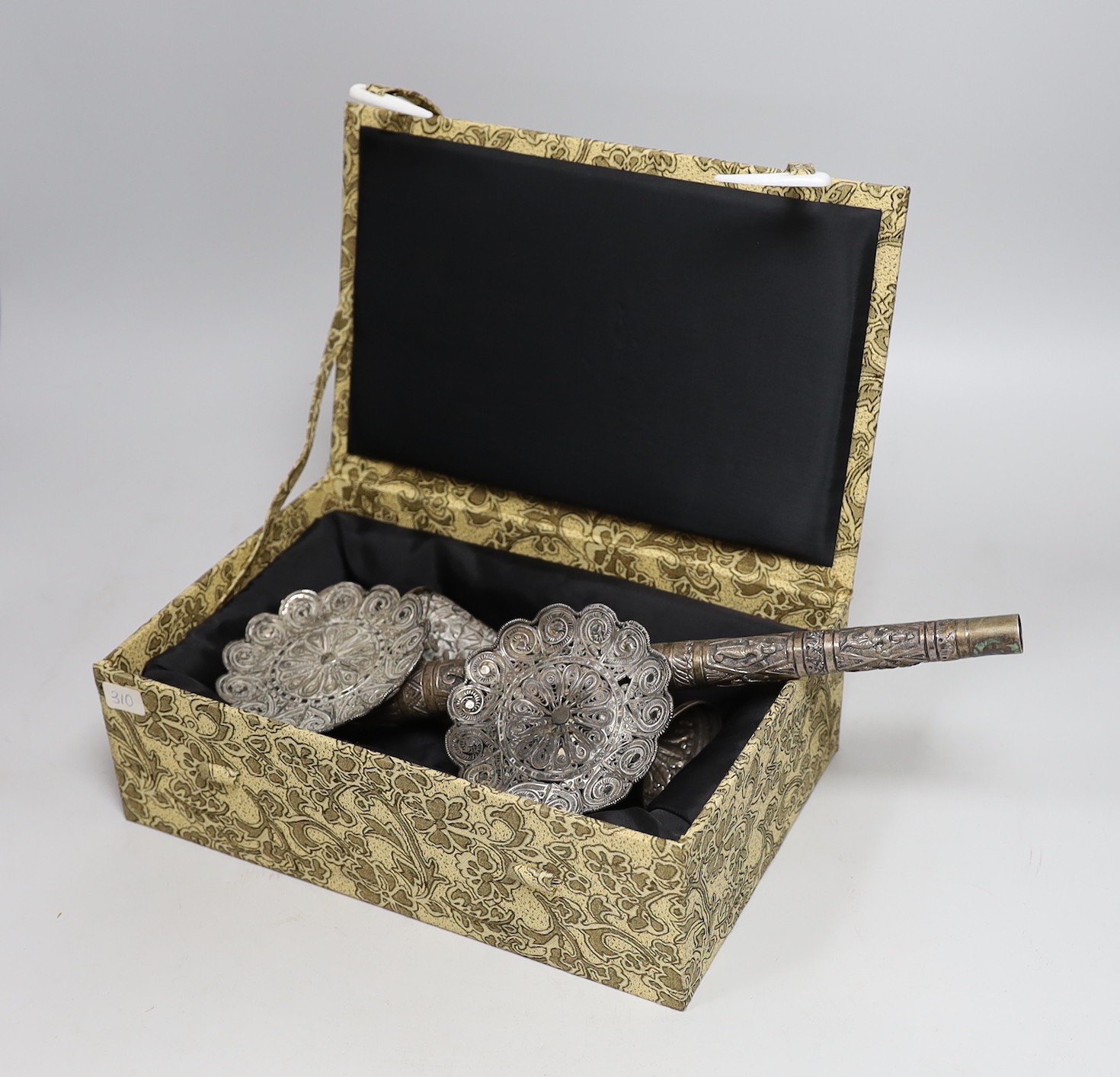 A Burmese white metal parasol handle, 33.2cm, a pair of Indian white metal spill vases and a pair of filigree dishes.